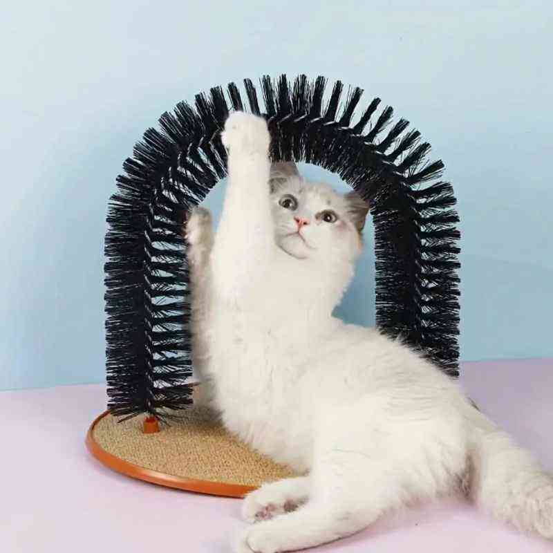 gato jugando con arco rascador masajeador purrfect arch